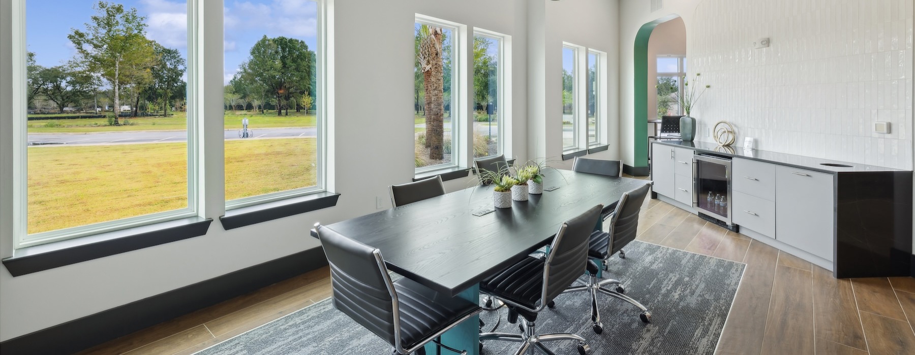 a private clubroom with a table and chairs